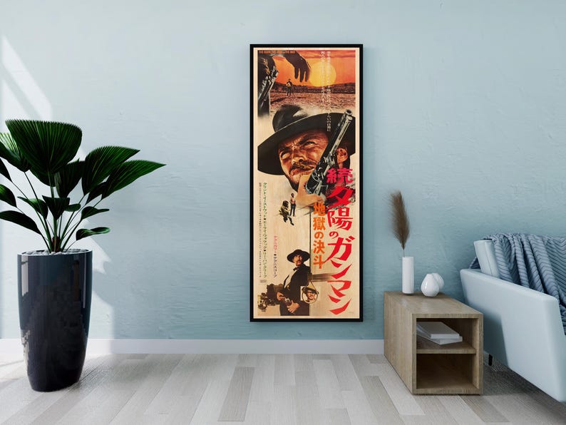 a framed movie poster of a man with a gun, hanging on a wall in a living room setting.