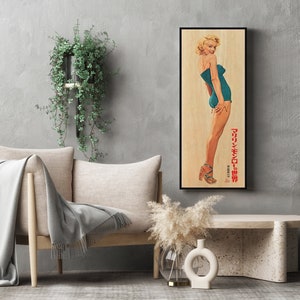 a picture of a woman in a bathing suit on a wall
