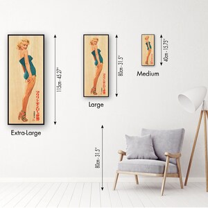 a room with a chair and three pictures on the wall