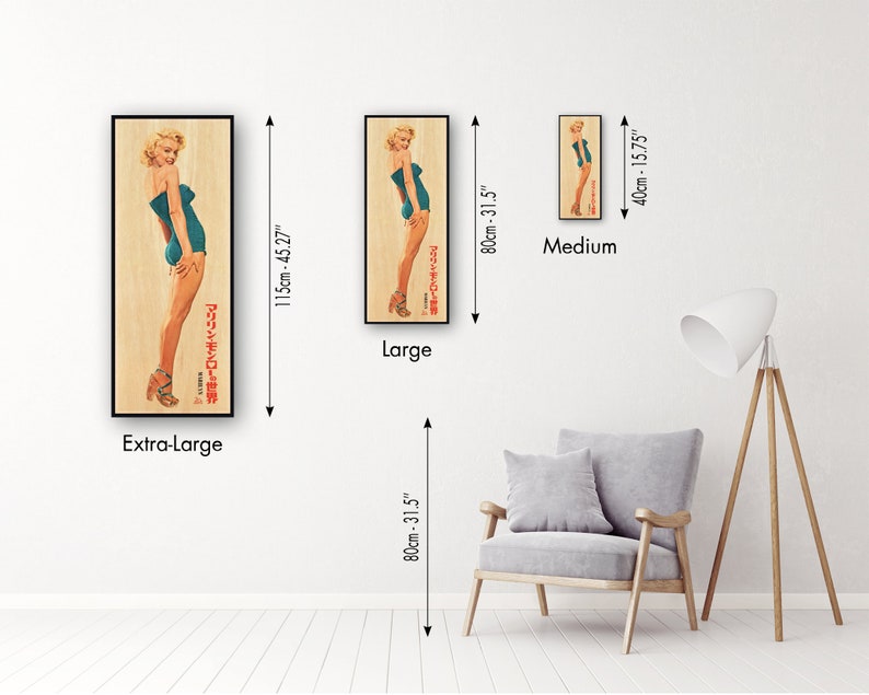 a room with a chair and three pictures on the wall