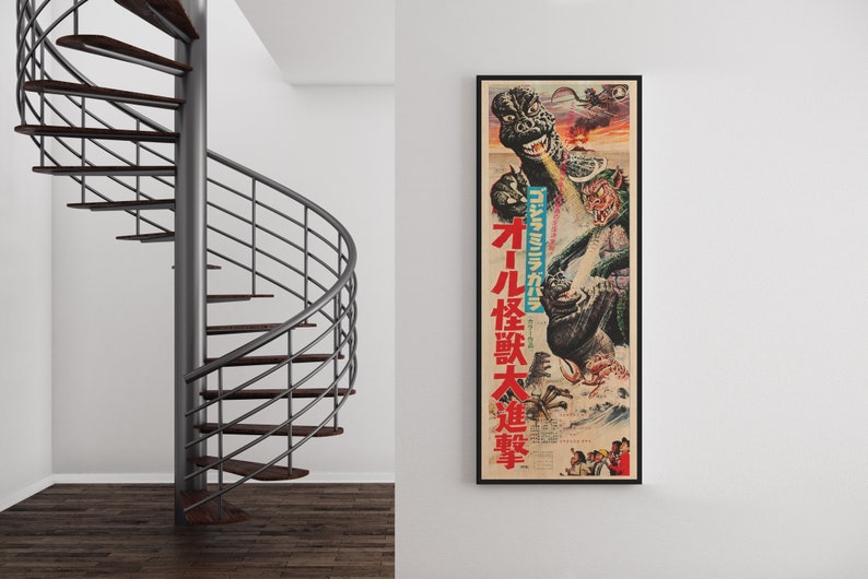 a spiral stair case next to a poster on a wall