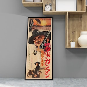 a framed poster of a man with a gun, displayed on a wall in a room with shelves and a vase.