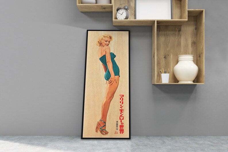 a picture of a woman in a bathing suit hanging on a wall