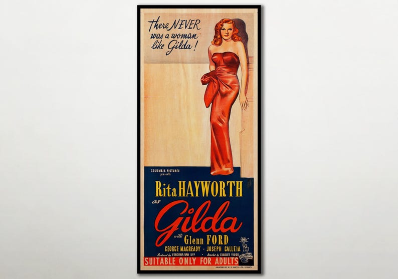 The image is a vintage movie poster featuring a woman in a red dress, likely from the film "Gilda". The poster includes text and a drawing of the woman, promoting the film and its stars.