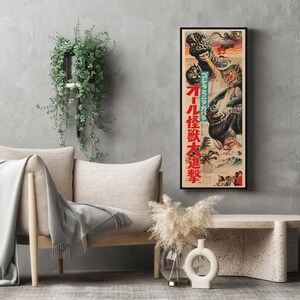 a living room with a couch and a poster on the wall