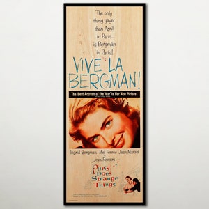 Op de afbeelding: Een vintage filmposter voor de film "Parijs doet vreemde dingen" met Ingrid Bergman. De poster toont een close-up van Bergmans gezicht met de tekst "Vive La Bergman!" en "De beste actrice van het jaar in haar nieuwe film!"