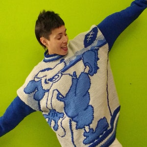 Handmade oversized sweater with a pixel art of Mickey Mouse