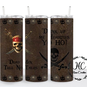 May include: A brown and black stainless steel tumbler with a pirate skull and crossbones design. The tumbler has the text "Drink Up Me Hearties Yo Ho!" and "Dead Men Tell No Tales".