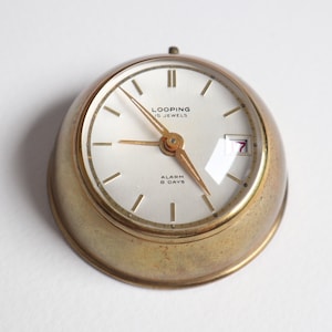 Looping clock - Etsy 日本
