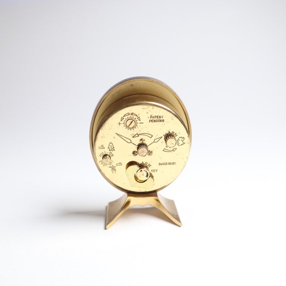 Vintage Swiza 8-day Alarm Clock: Swiss Made Brass Travel Clock