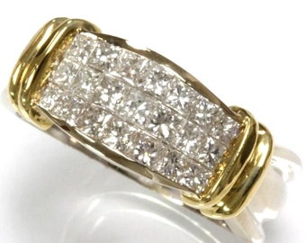 Op de afbeelding: Een gouden en zilveren bandring met een rij vierkante diamanten.