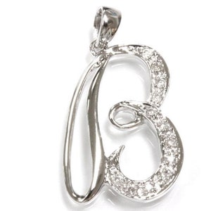 May include: A silver pendant in the shape of the letter B, with small clear stones set around the edges.
