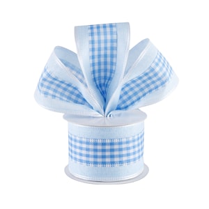 May include: A spool of blue and white gingham ribbon with a white center. The ribbon is tied in a bow on top of the spool.