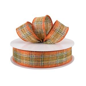May include: A roll of orange, green, and brown plaid ribbon with a bow tied on top. The ribbon is made of a burlap-like material.