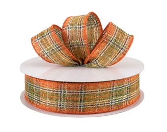 May include: A roll of orange, green, and brown plaid ribbon with a bow tied on top. The ribbon is made of a burlap-like material.
