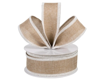May include: A spool of tan, textured ribbon featuring a woven fabric appearance. The ribbon is wrapped around a white plastic core and features a distinct white stitched edge detail along both sides, with a large decorative loop on top.