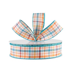 May include: A roll of decorative ribbon with a plaid pattern in orange, blue, and yellow. The ribbon has a turquoise border and is arranged in a bow shape on top of the roll. The ribbon is suitable for crafts and gift wrapping.