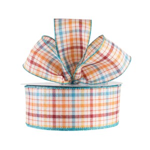 May include: A roll of plaid ribbon with a teal trim. The ribbon is orange, red, and blue plaid.