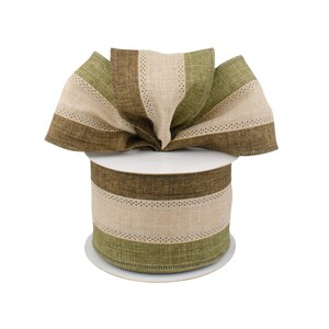 May include: A roll of green, brown, and beige striped ribbon with a white dotted pattern. The ribbon is made of a textured fabric and is tied into a bow.