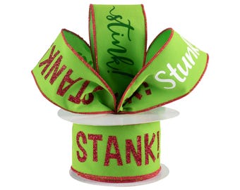 Può includere: Una bobina di nastro verde lime brillante con bordi glitterati rossi e la parola STANK! stampata in lettere maiuscole glitterate rosse. Il nastro è arricciato nella parte superiore per mostrare chiaramente il testo sullo sfondo in tessuto.