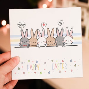 うさぎとカラフルな卵のハッピーイースターサンデーのかわいいカード。年齢を問わず、大人も子供も楽しめます（サイズ：A6/A5/A4/スクエア6x6インチ）。