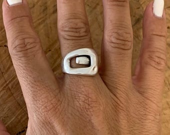 Bold, chunky, silver adjustable ring—perfect for birthdays. statement jewelry, a stylish silver gift for a friend or mom. on trend