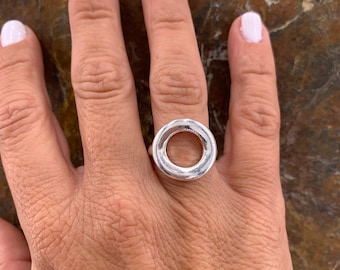 Chunky silver plated ring with a large open circle design, bold everyday jewelry