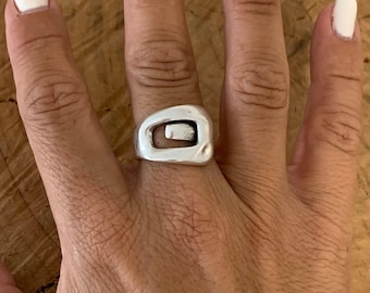 Bold, chunky, silver adjustable ring—perfect for birthdays. statement jewelry, a stylish silver gift for a friend or mom. on trend