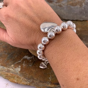 Orecchini Gucci collezione Boule in argento 925 con catena a palline