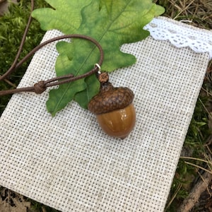 Natural Acorn pendant with on a leather cord with adjustable length, epoxy resin jewelry, wood elf jewelry, wooden necklace, unisex.