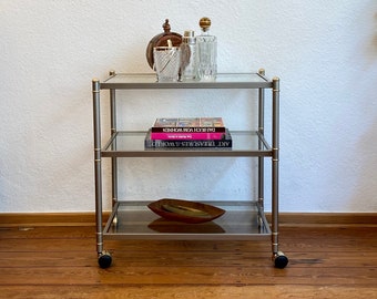 70s bicolor bar trolley with glass trays.