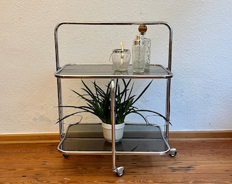 1970s chrome dinette/serving trolley with glass trays.