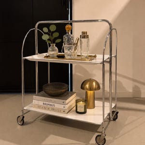 Carrito de bar DINETT de los años 70 | Carrito de servicio plegable cromado | Carrito de té rodante de estilo moderno de mediados de siglo | Muebles vintage alemanes