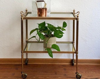 Neoclassical French brass bar cart with removable tray.