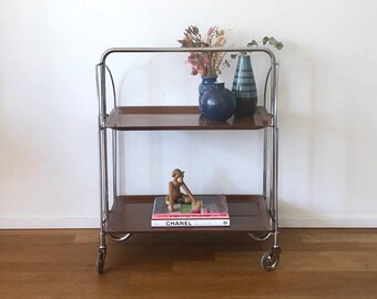 1970s chrome dinette/serving trolley with brown trays.