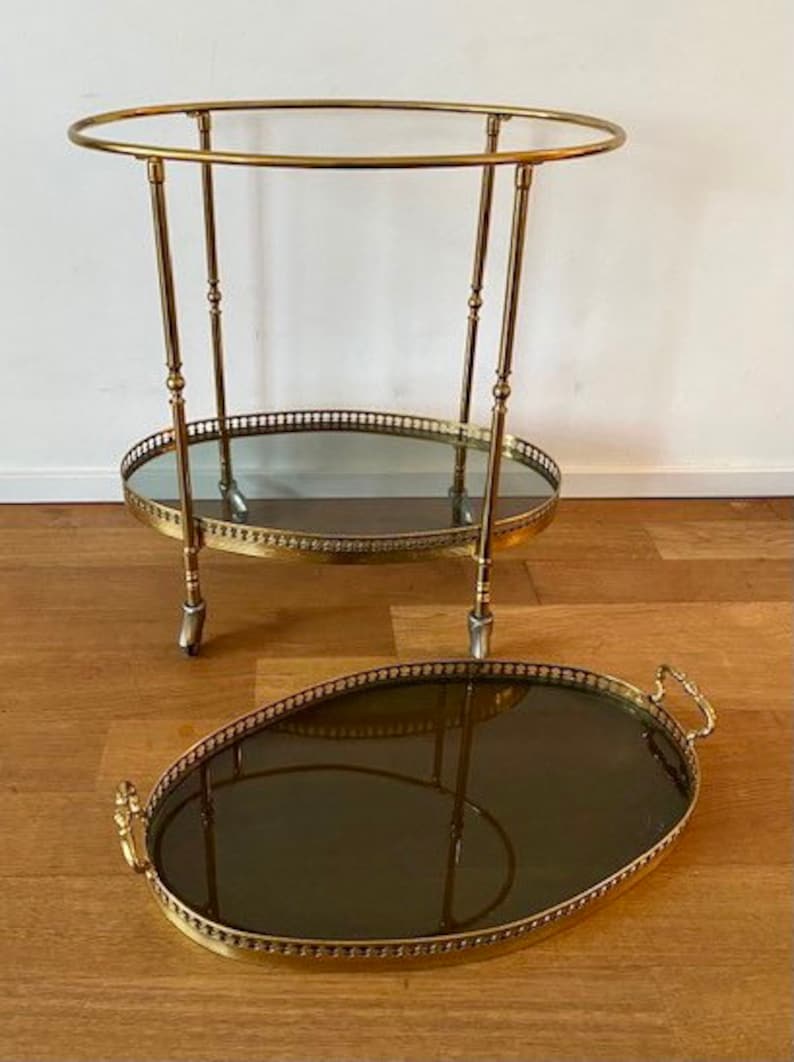 Oval French brass bar cart.