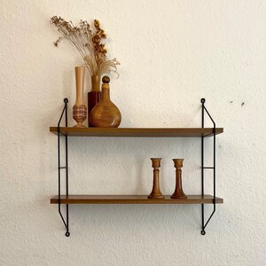 60s wall shelf in string design. image 1