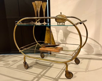 Art Deco 20s/30s golden bar cart made of brass.