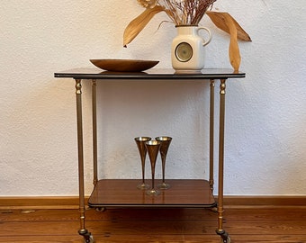 Mid Century 50s 60s bar cart, tea cart, serving cart with a brass rack on small wheels.