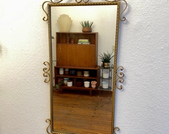 A very unusual 60s wall mirror.