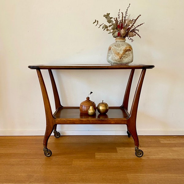 Mid Century wooden serving trolley with a glass plate.