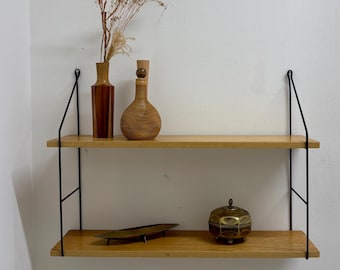 1960s wall shelf in String design.