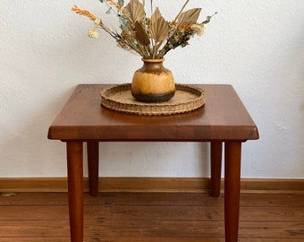 Solid teak living room table. Made in Denmark.