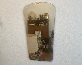Classic 50s wall mirror.