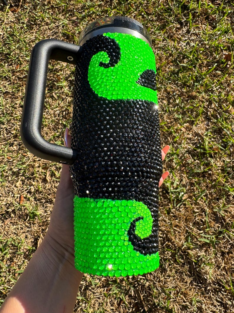 Witch green and black blinged protour Stanley tumbler green swirl