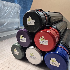 Travel Storage Tubes - a perfect accessory for you mat!  3" or 4" diameter available, and in multi-color tops.