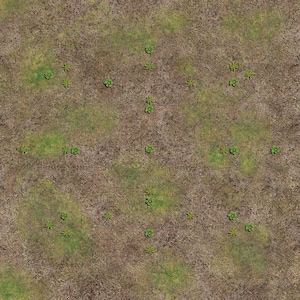 May include: Overhead view of a textured, brown and green terrain mat. Small green plants are scattered across the surface. The mat has a detailed, naturalistic appearance, suitable for tabletop gaming or model displays.