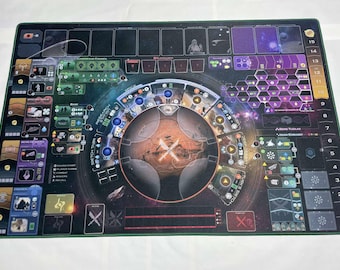 May include: A black and green game board with a circular, multi-colored, space-themed design. The board features a central area with a planet and a grid of hexagonal spaces. The board also includes a number track, a set of icons, and a set of cards.