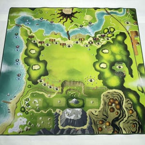 May include: A green and brown game board with a large green area in the center. The board has a variety of different features, including a river, a mountain, and a forest. There are also several paw prints on the board.