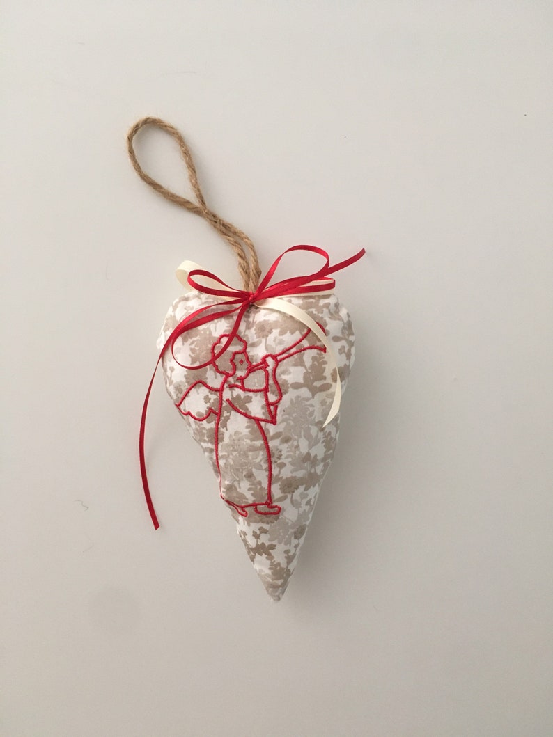 Red hanging angel